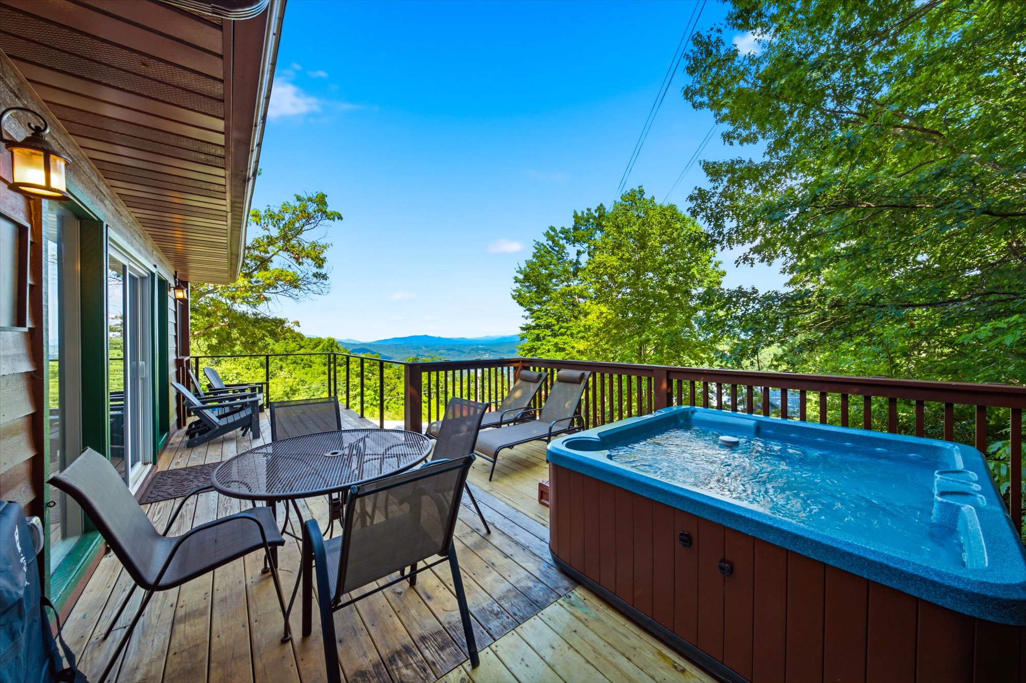 Five-person hot tub with mountain views, and the Ober Mountain tram glides right past the property.