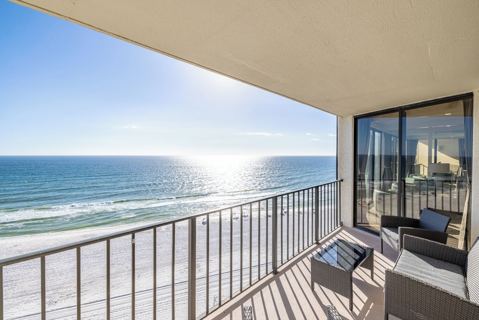 Private balcony overlooking the gorgeous white sand