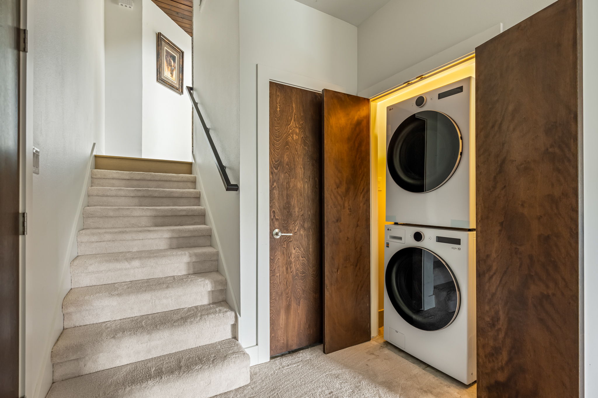 Convenient laundry area with full-size washer and dryer