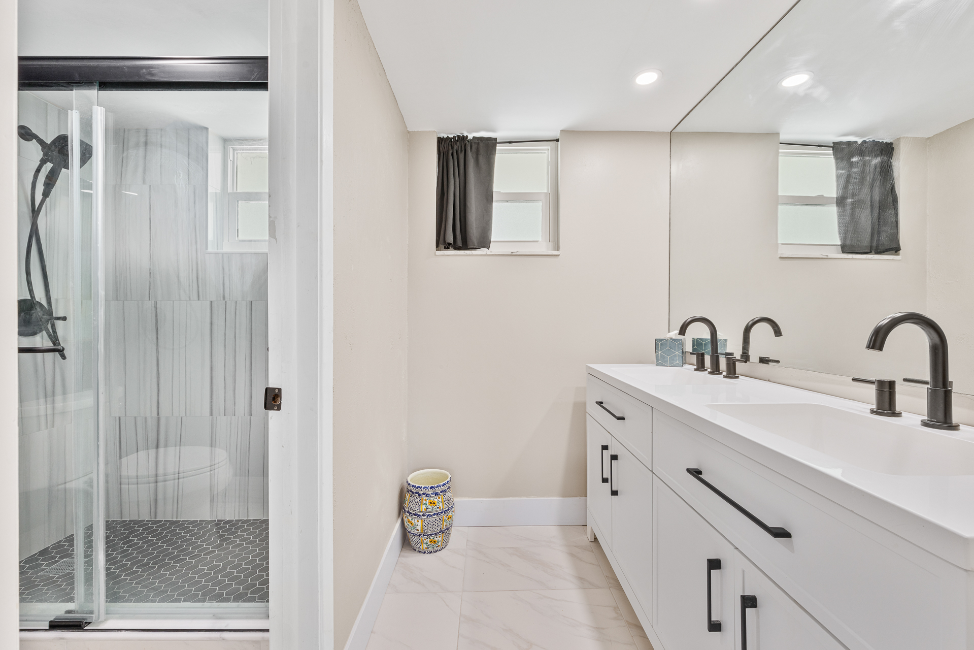 Private toilet room and walk-in shower.