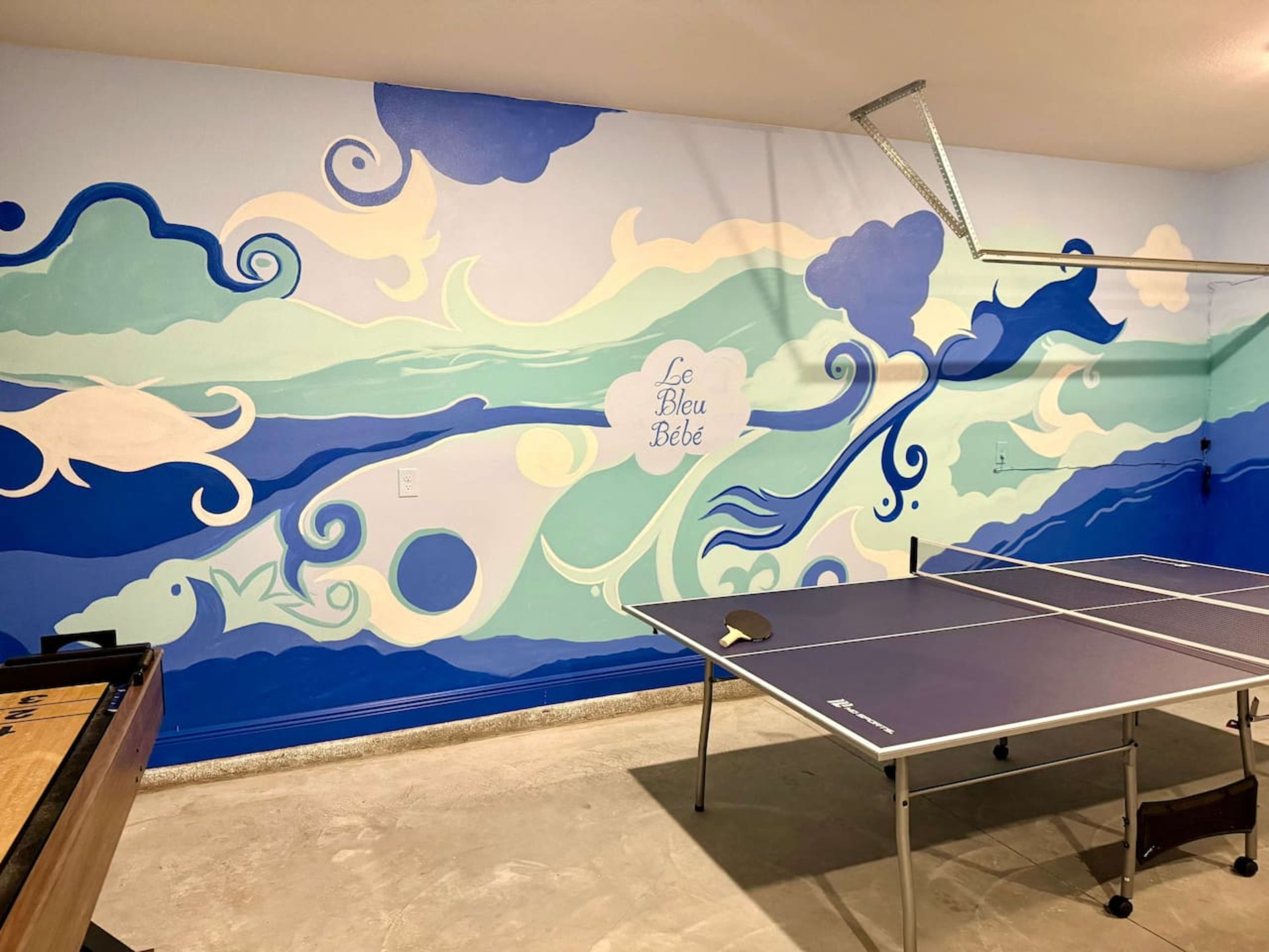Fun-filled game room with arcade machines, ping pong, and shuffleboard—entertainment for all ages.