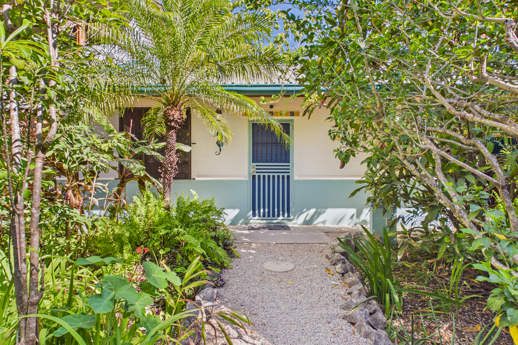 Pathway from covered parking to the front of house