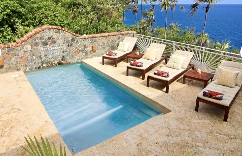 Private Pool Private pool with loungers and waterfall feature—your own sunny retreat.