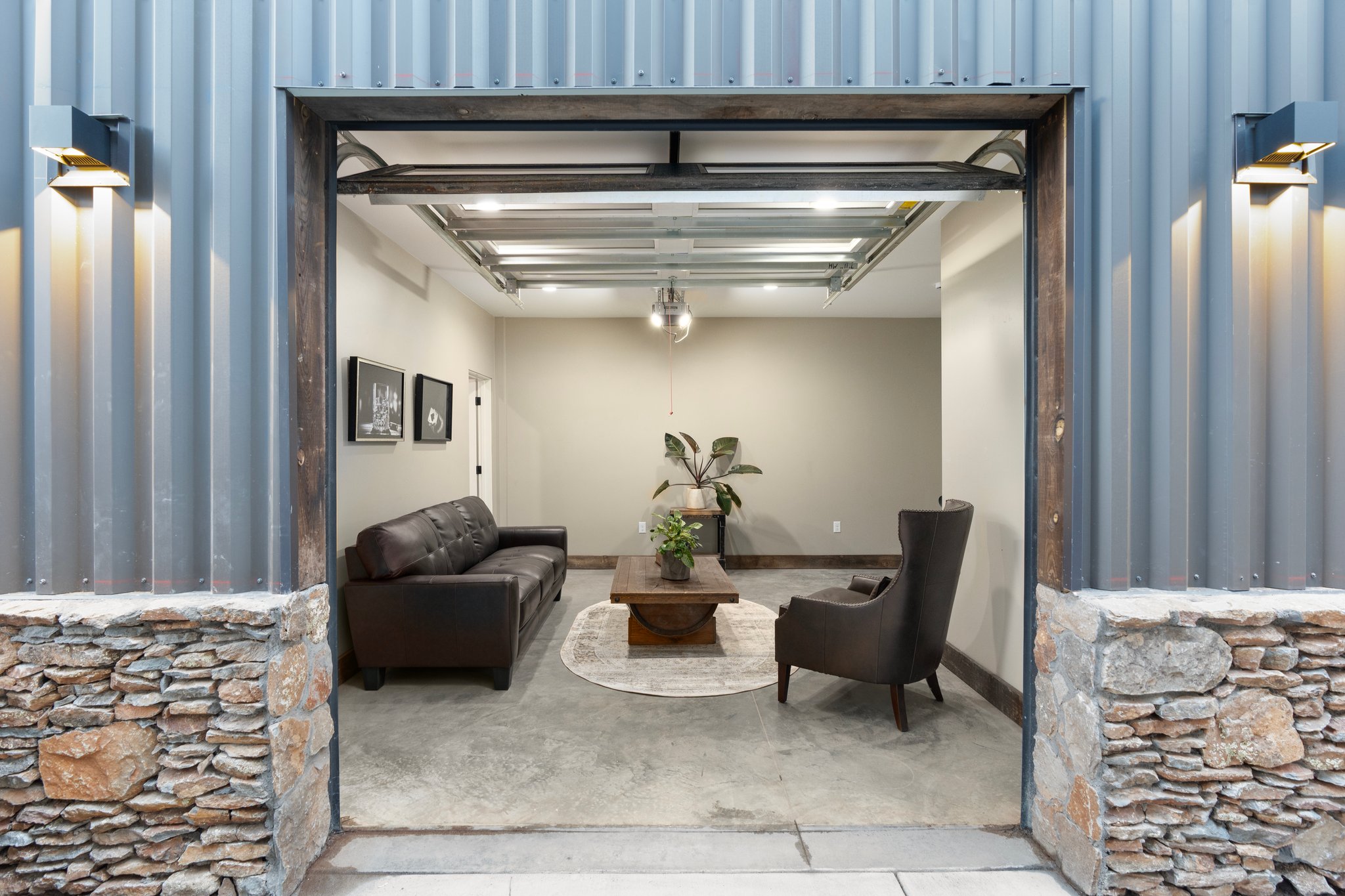 Break out room opens up by garage door to outdoor courtyard