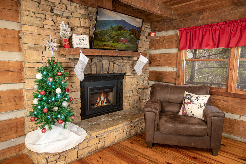 Relax by the fire with festive holiday decor.