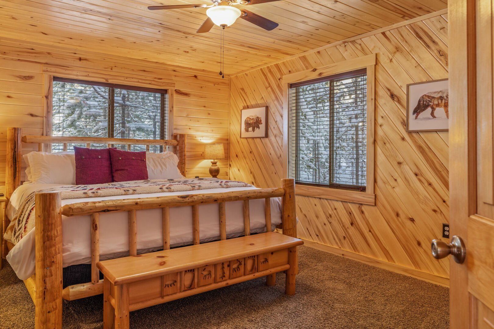 Master bedroom w/ king sized bed and private ensuite bathroom