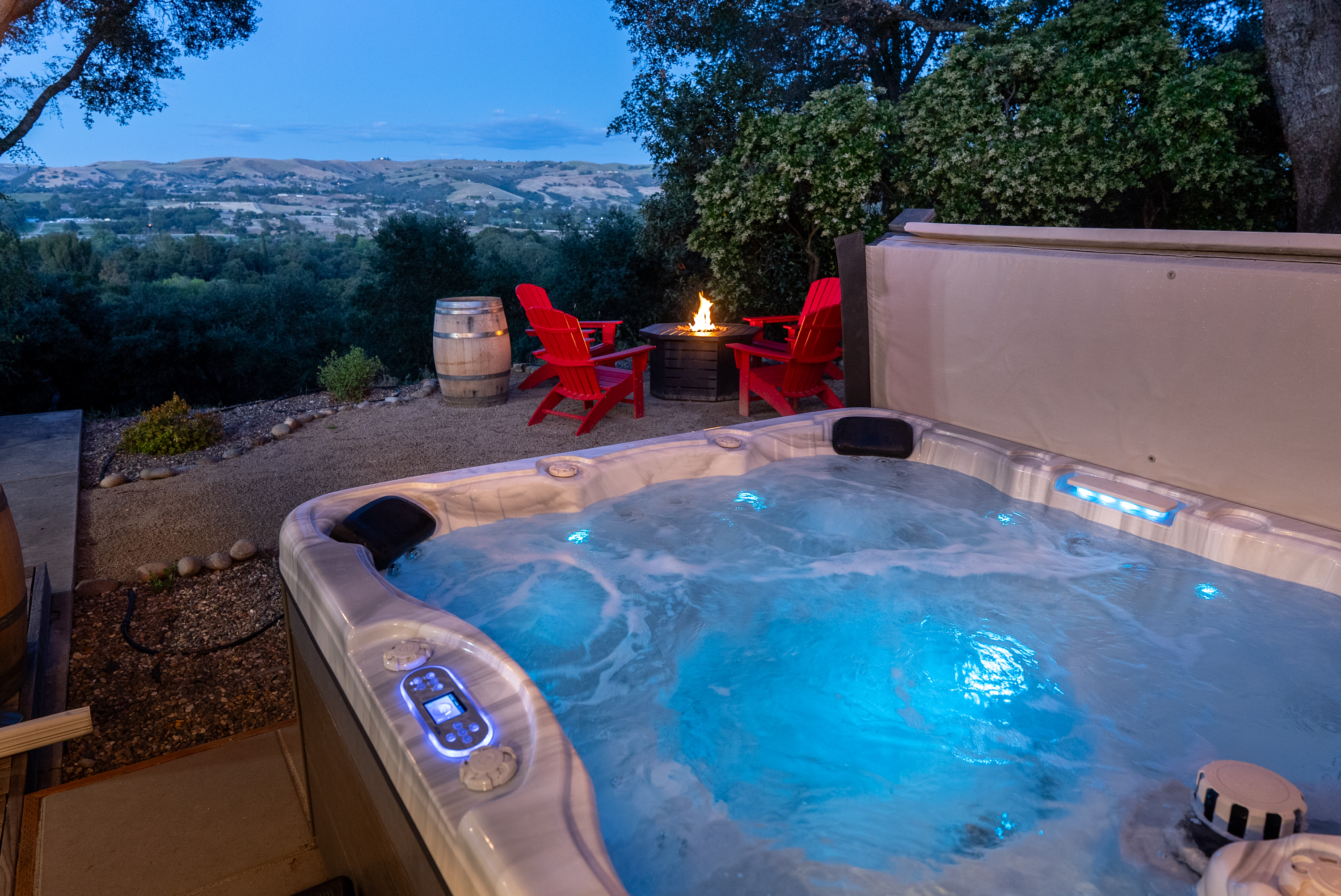 Soak away the day with bubbling jets and sweeping valley views.