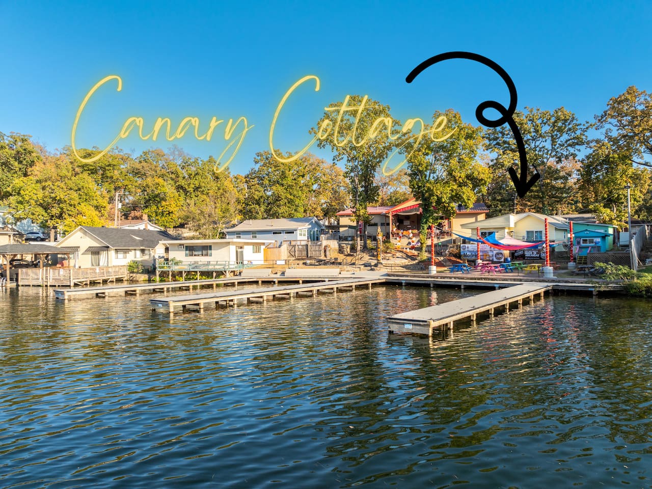 The Back Deck of the Canary Cottage overlooks the Lakeside Patio and Boat Docks!  The Back Deck is not shared, but you will likely see Restaurant Patrons using the Lakeside Patio.