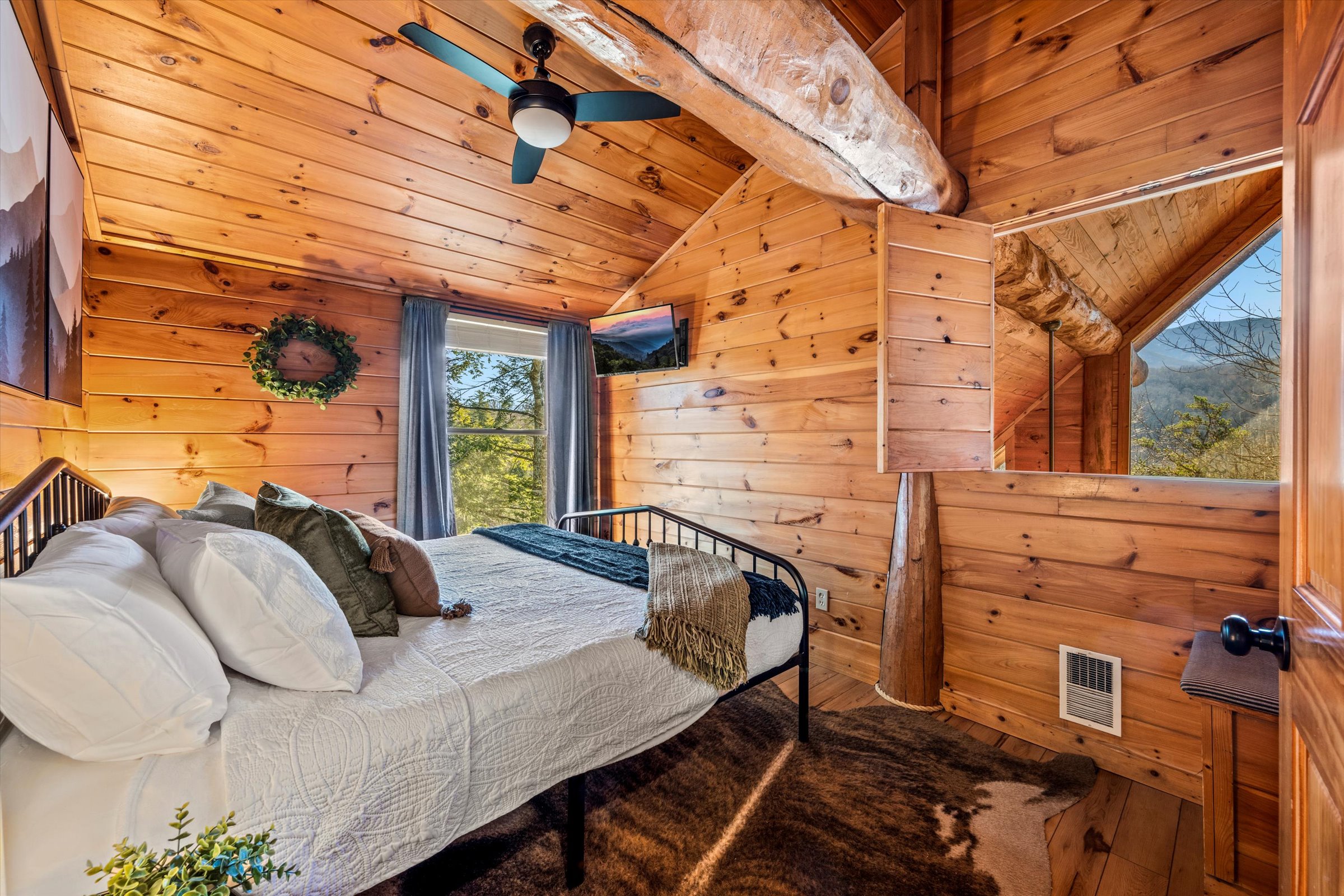 Enjoy the mountain views from the upstairs king bedroom