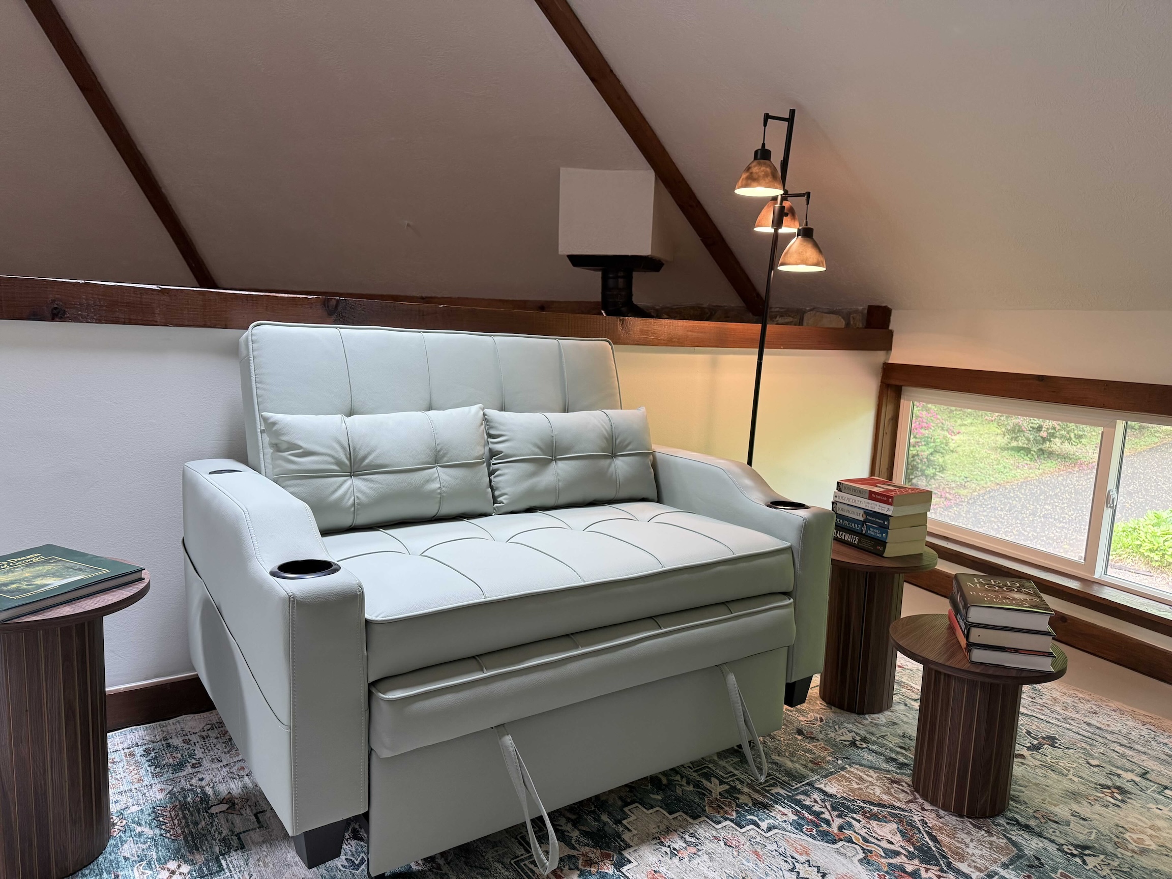 Sleeper chair and reading nook in the loft area