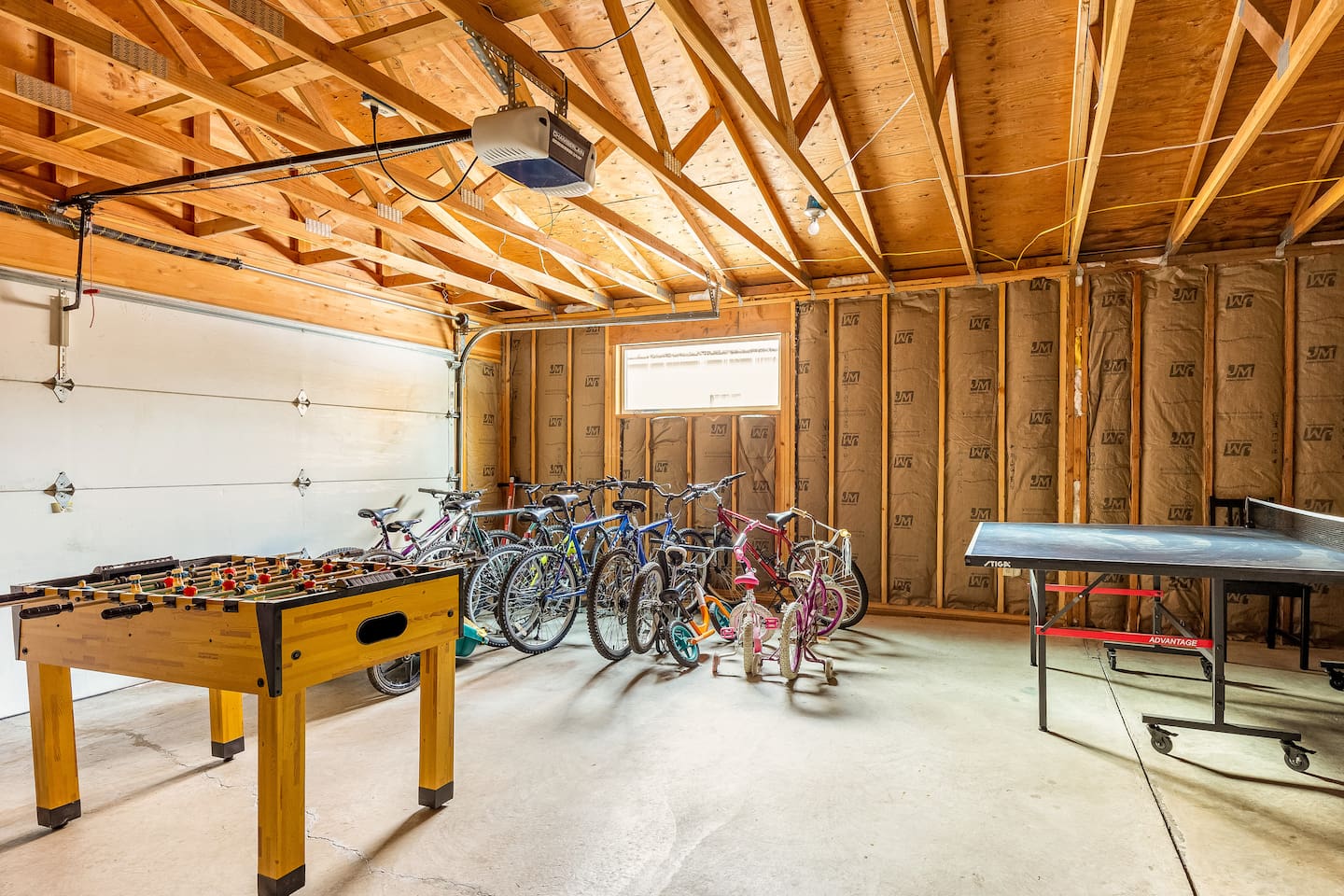 The garage also features a foosball table and plenty of bikes. 