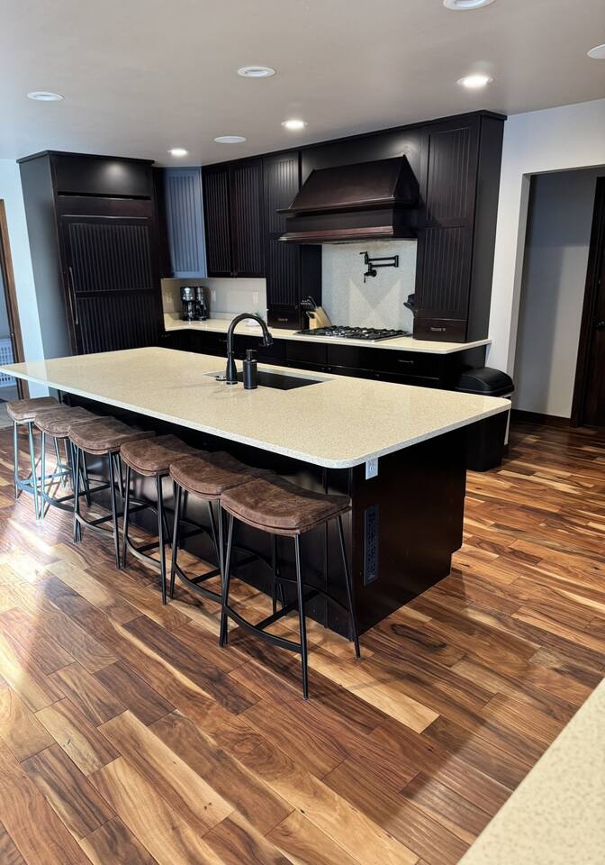 Chef's Kitchen with large island and seating - great for family breakfasts and group cooking.