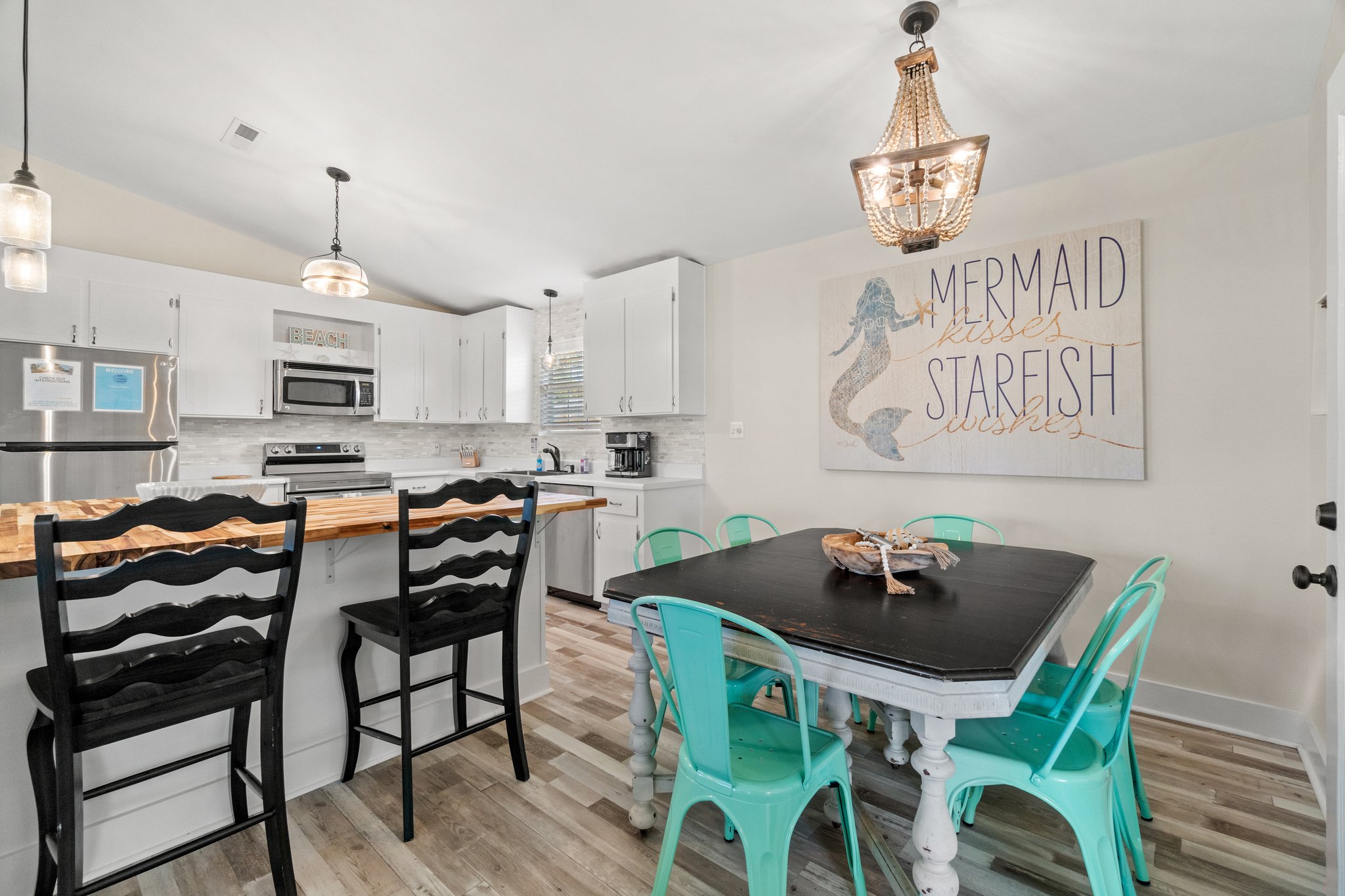 Take a foodie's paradise to the next level with this beautiful beach home complete with a large, beautiful eat-in kitchen!