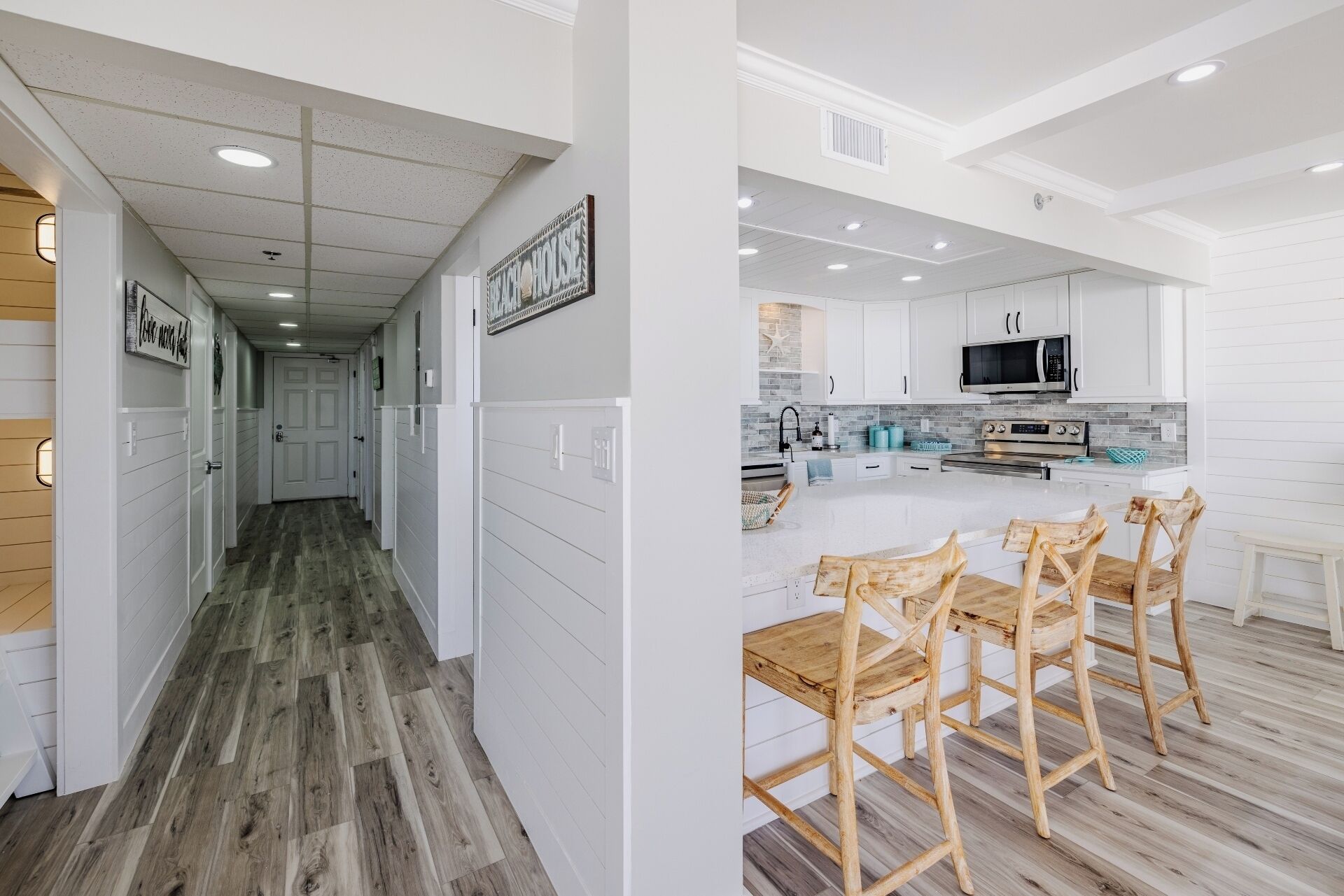 Bar seating and view of entry hall (and bunk nook)