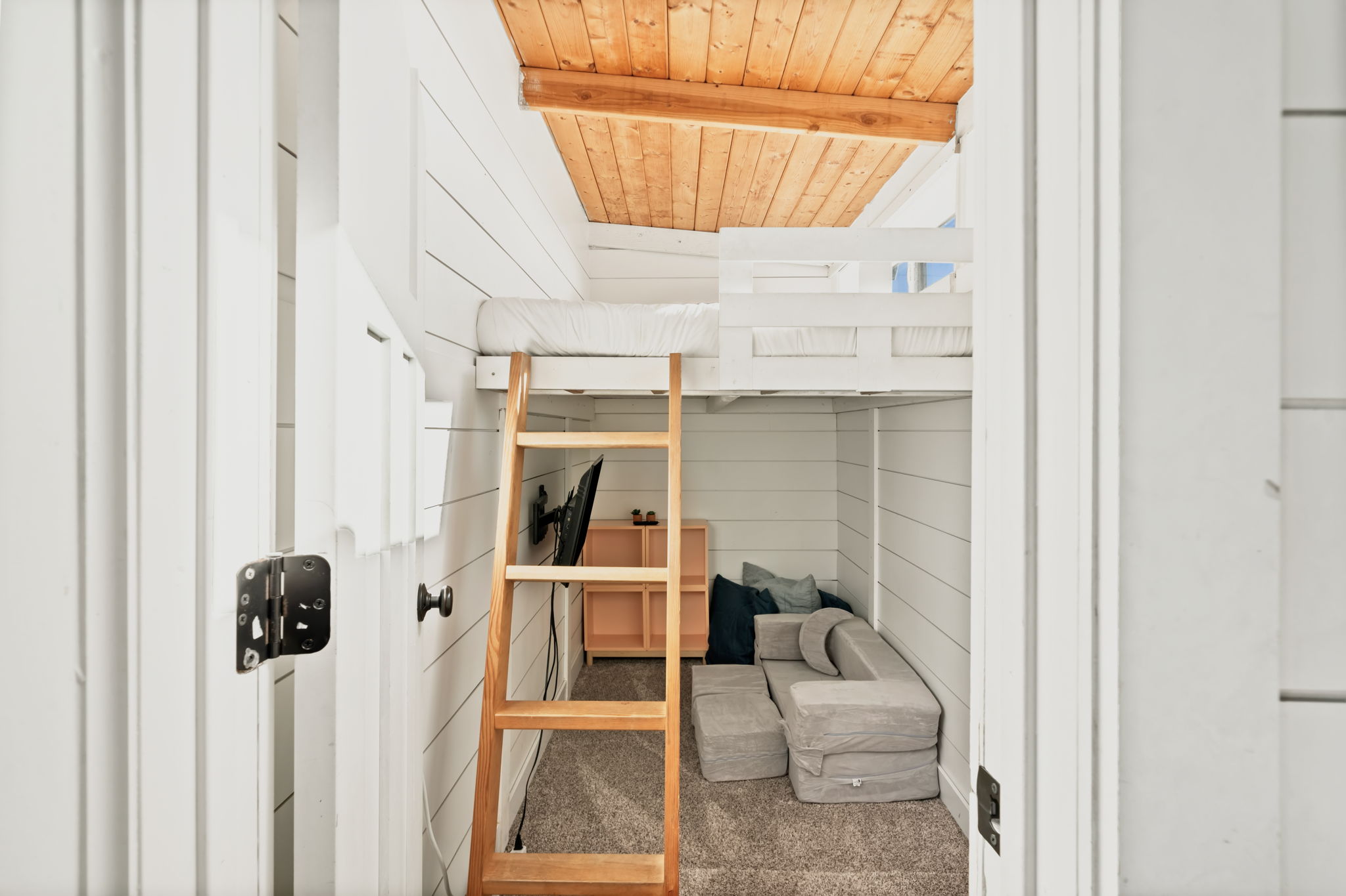 Queen size bed in the “Crows Nest” has one of the best views in the house and features kids play area