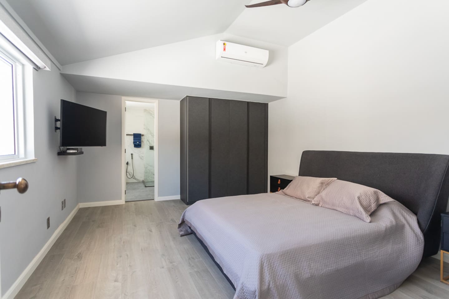 Beautiful queen bedroom on second floor with full super modern bathroom.  Room darkening shades in this room because it is so sunny!  (Bedroom 6).