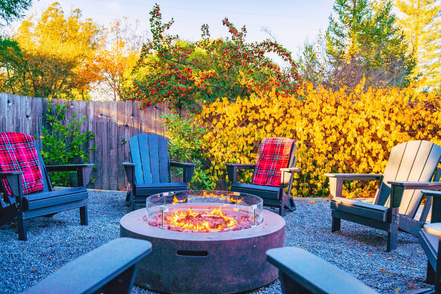 Relax in style by the fire! Adirondack chair and gas firepit ready for you.