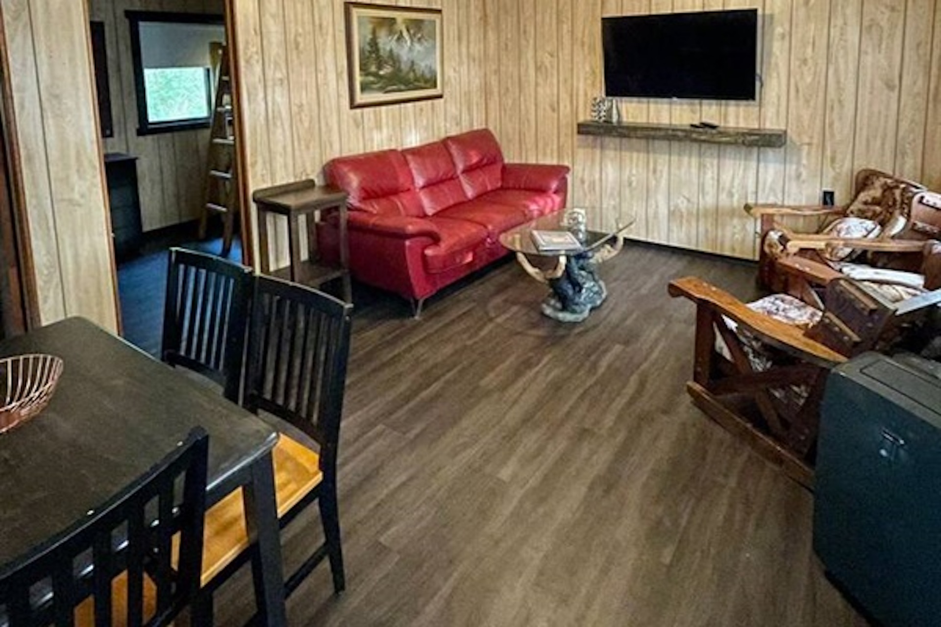 Open living and dining area inside Cottage #2