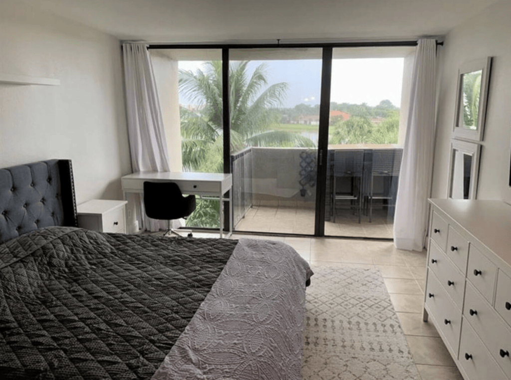The bedroom also features a conveniently located workspace, where great views of the lake can be had.