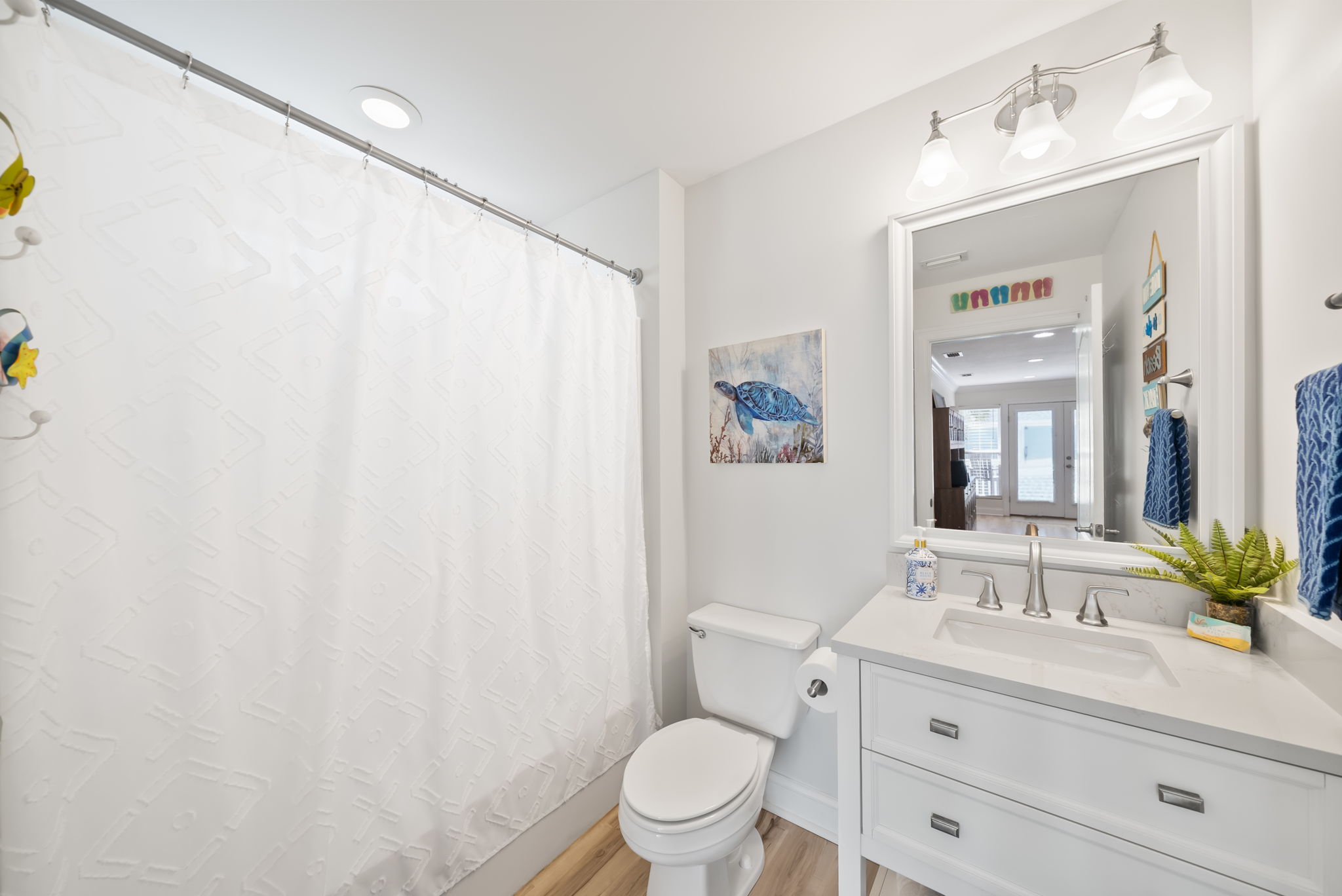 2nd floor full bathroom with a shower/tub combination.