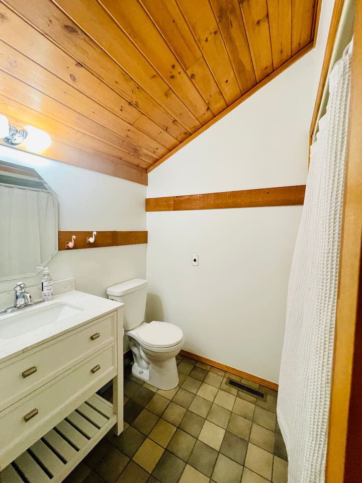 Bathroom vanity area with ample space for getting ready.