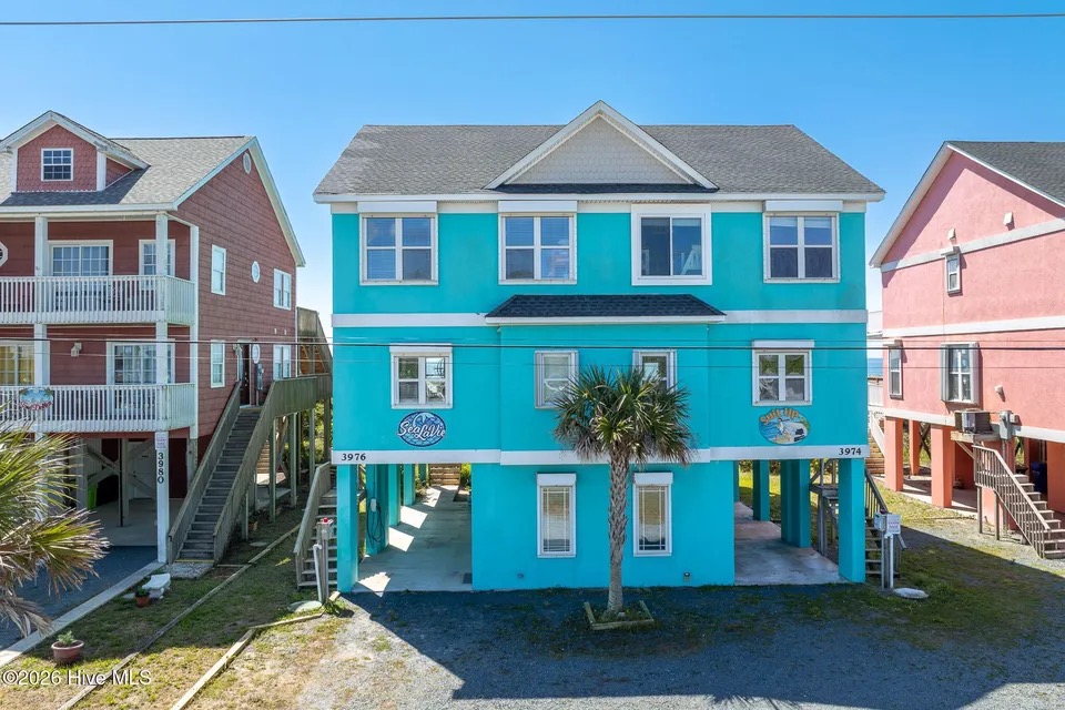 Sea La Vie is the left unit with plenty of parking