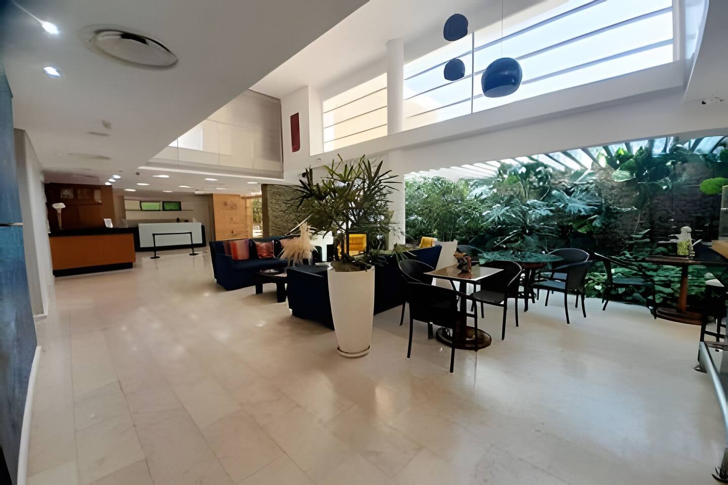 Spacious and bright lobby with natural light, perfect for unwinding!