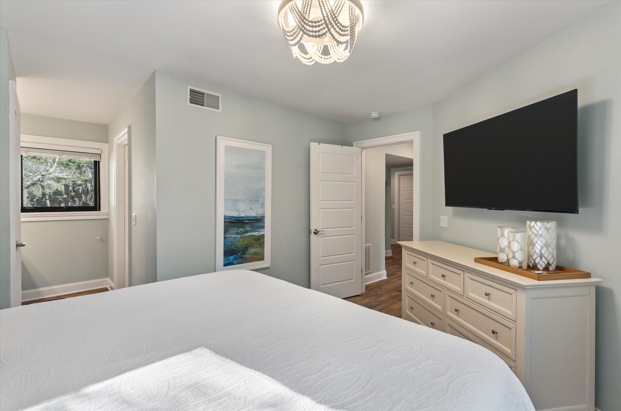 Primary suite with king bed and full bathroom