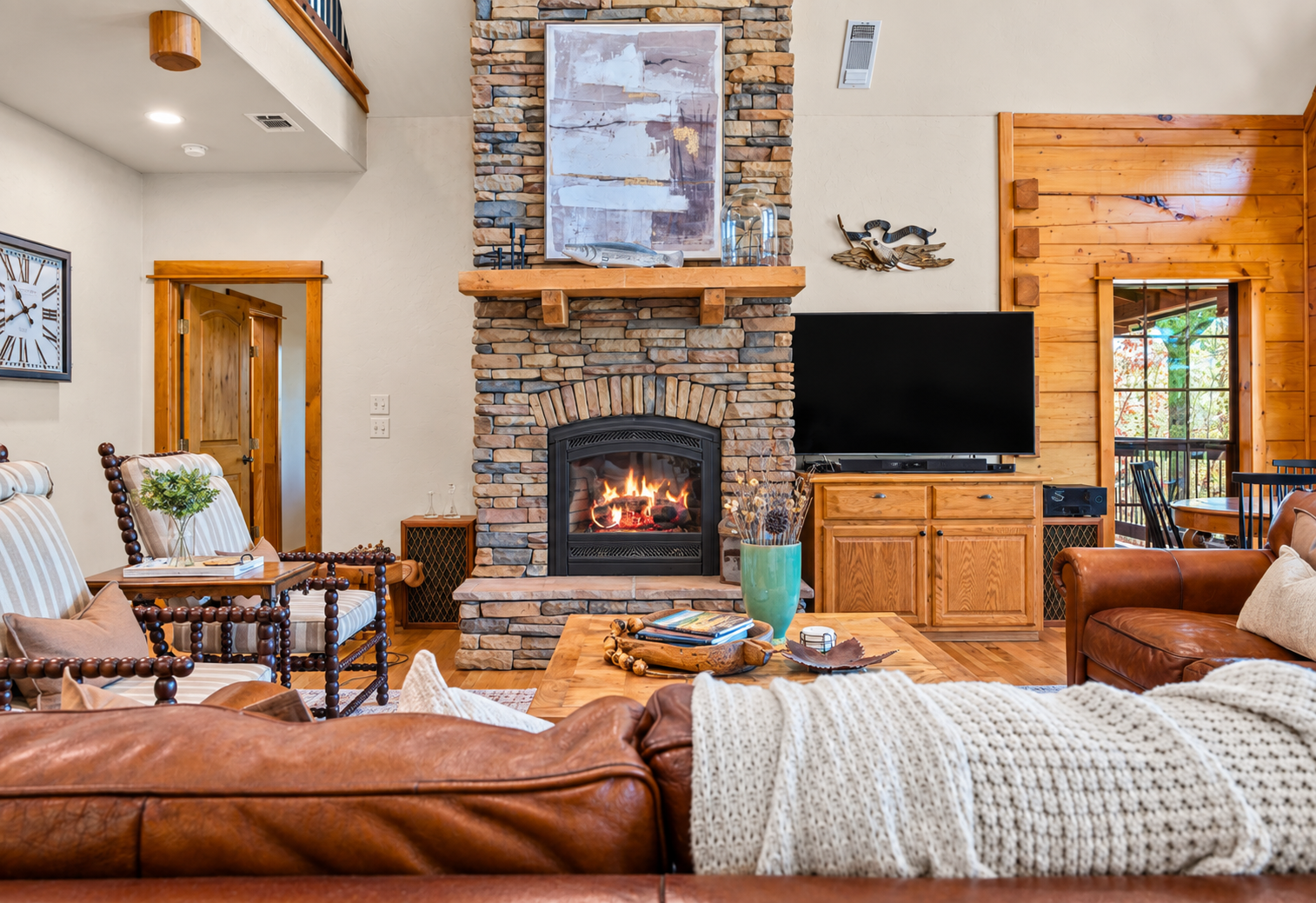 Cozy up by the stone fireplace and settle into vacation mode.