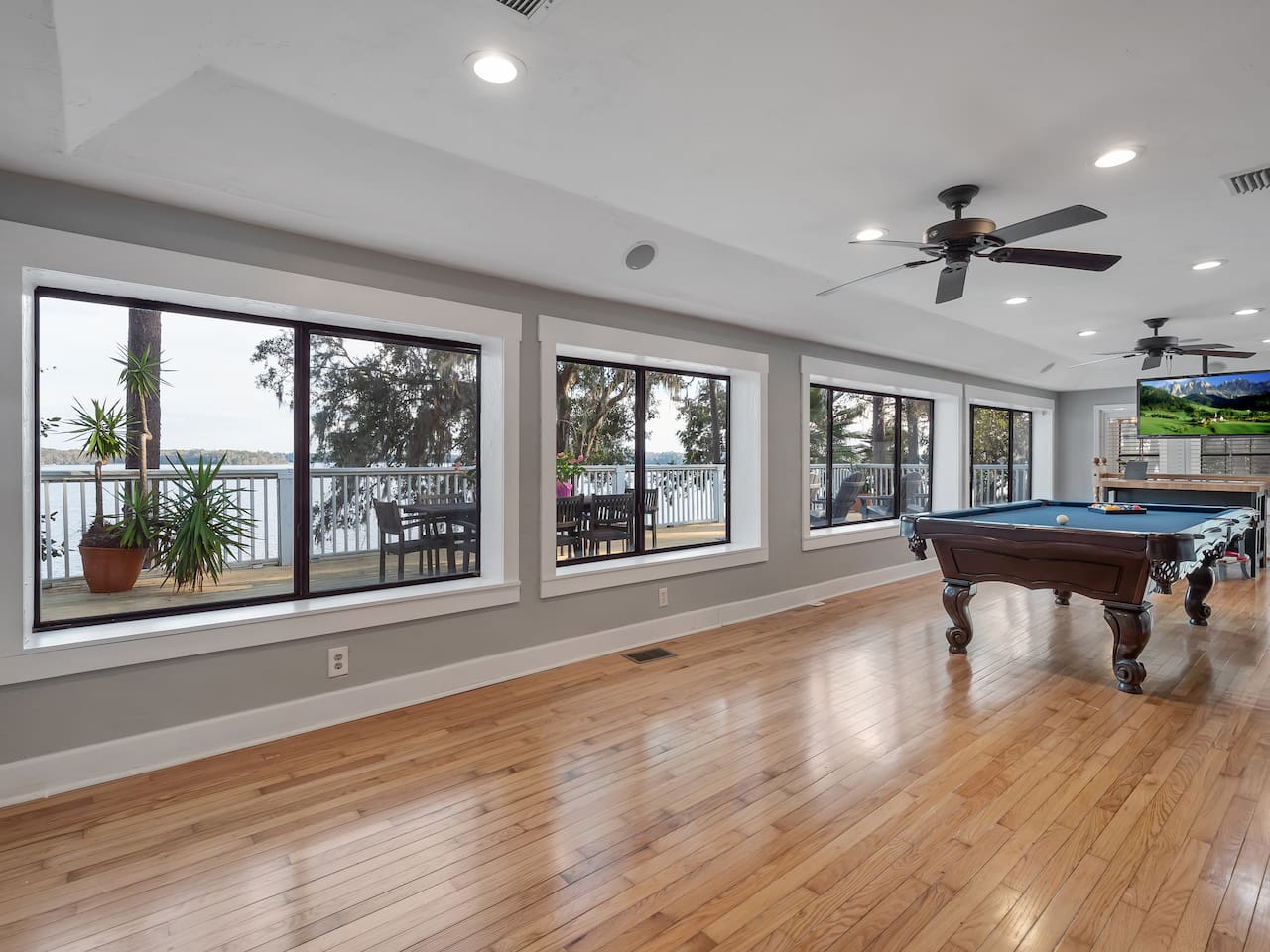 Pool table, lake view, stool seating, tv