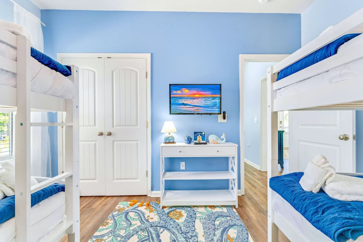 Bedroom 2: Twin bunk room offers plenty of sleeping space, Smart TV, and closet