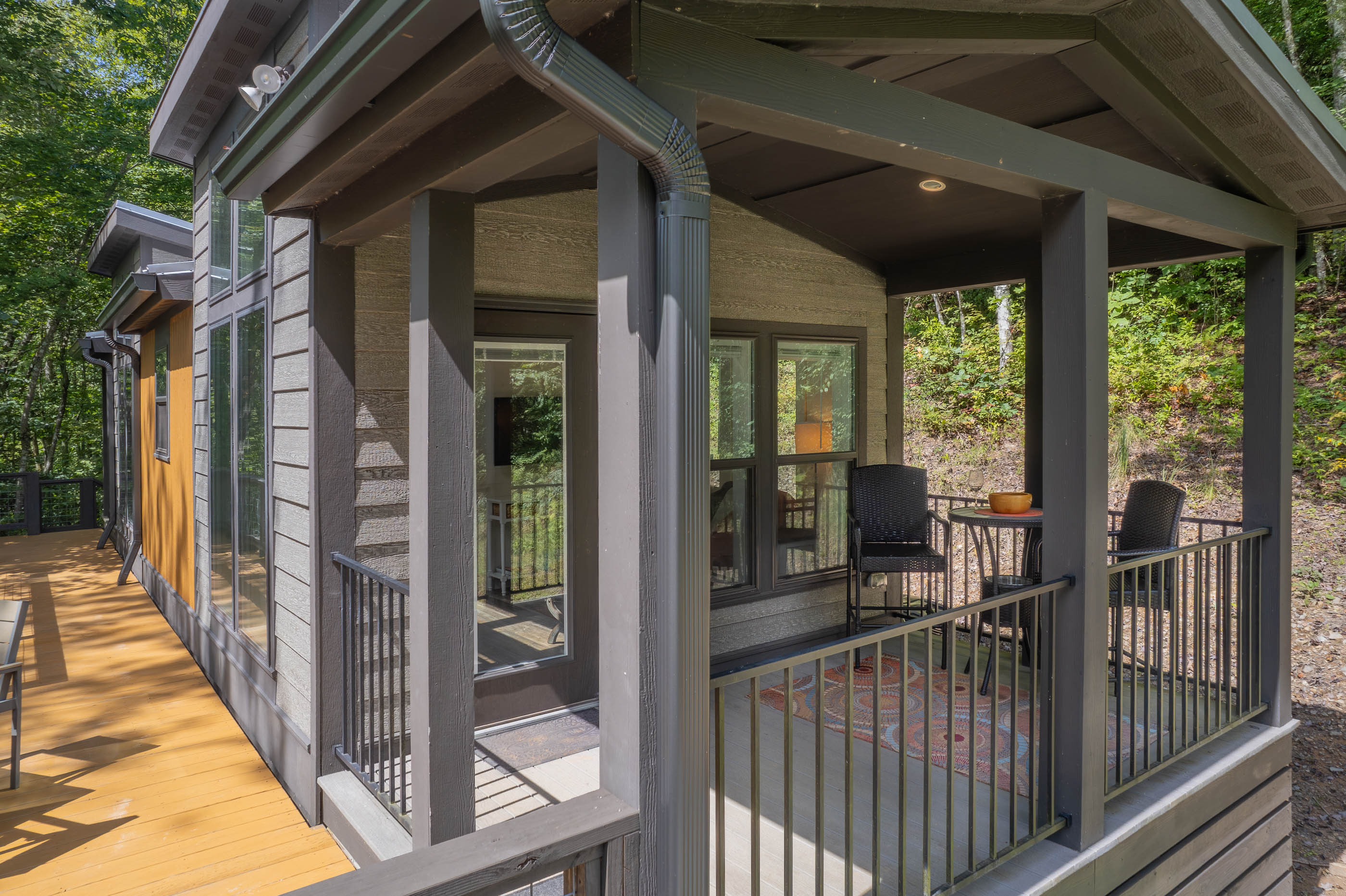 A welcoming entry with cozy seating and ambiance that shines day or night.