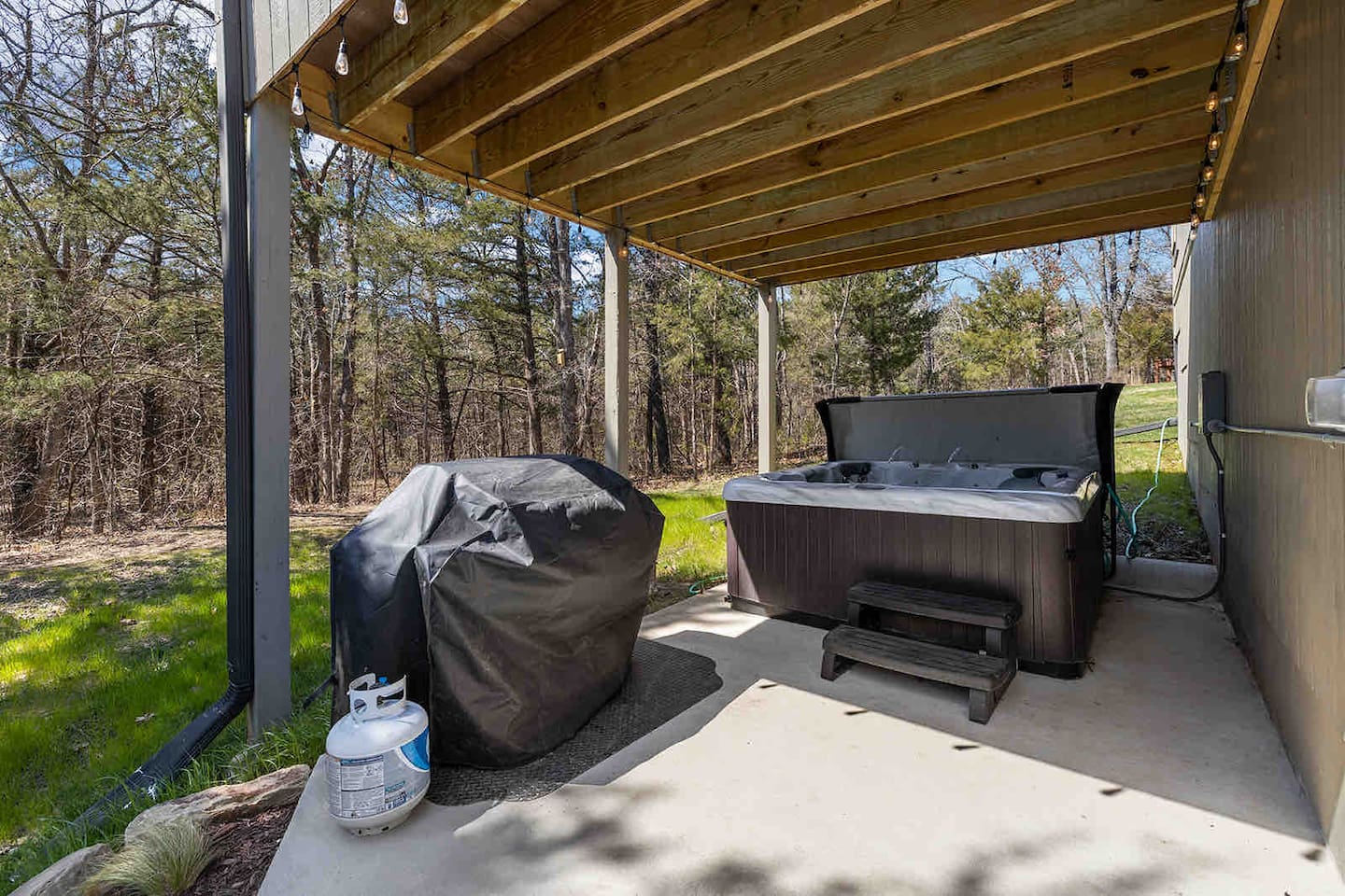 Outdoor hot tub and propane grill