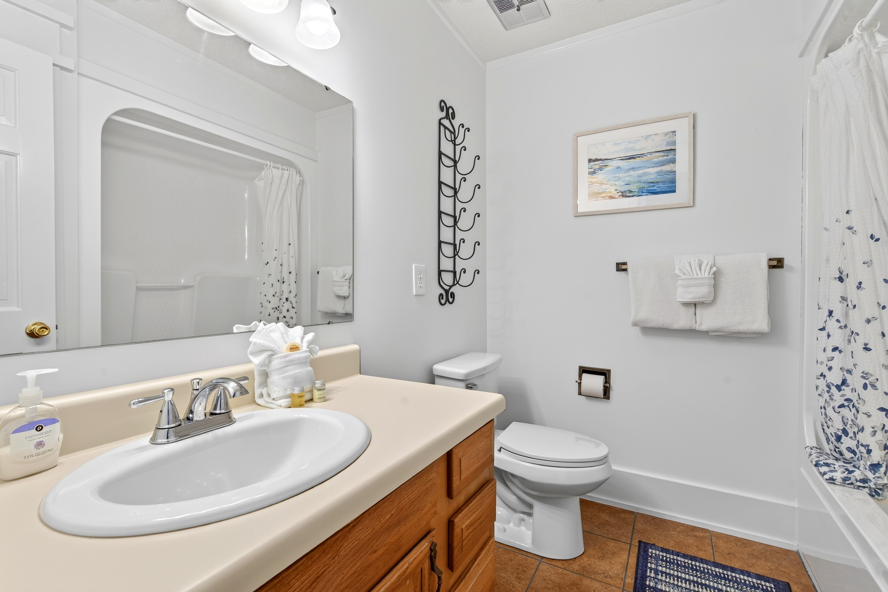 Upstairs bathroom with shower and tub combo