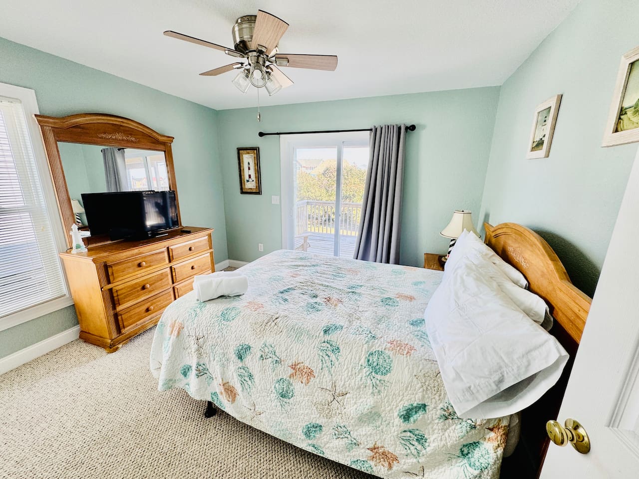 Comfortable Queen bedroom with Smart TV and private deck access.