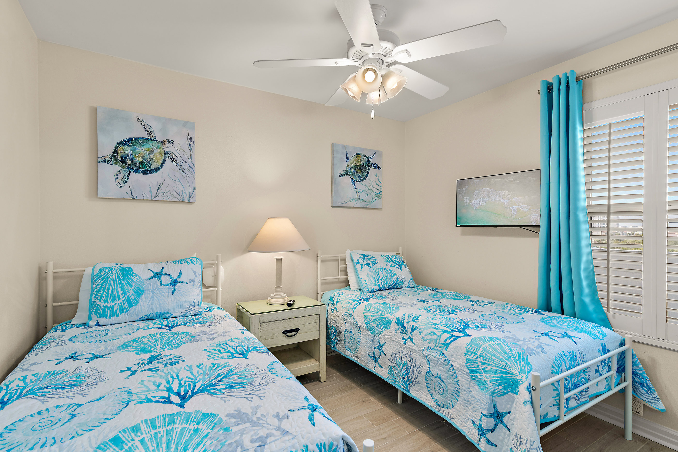 Twin beds in second bedroom