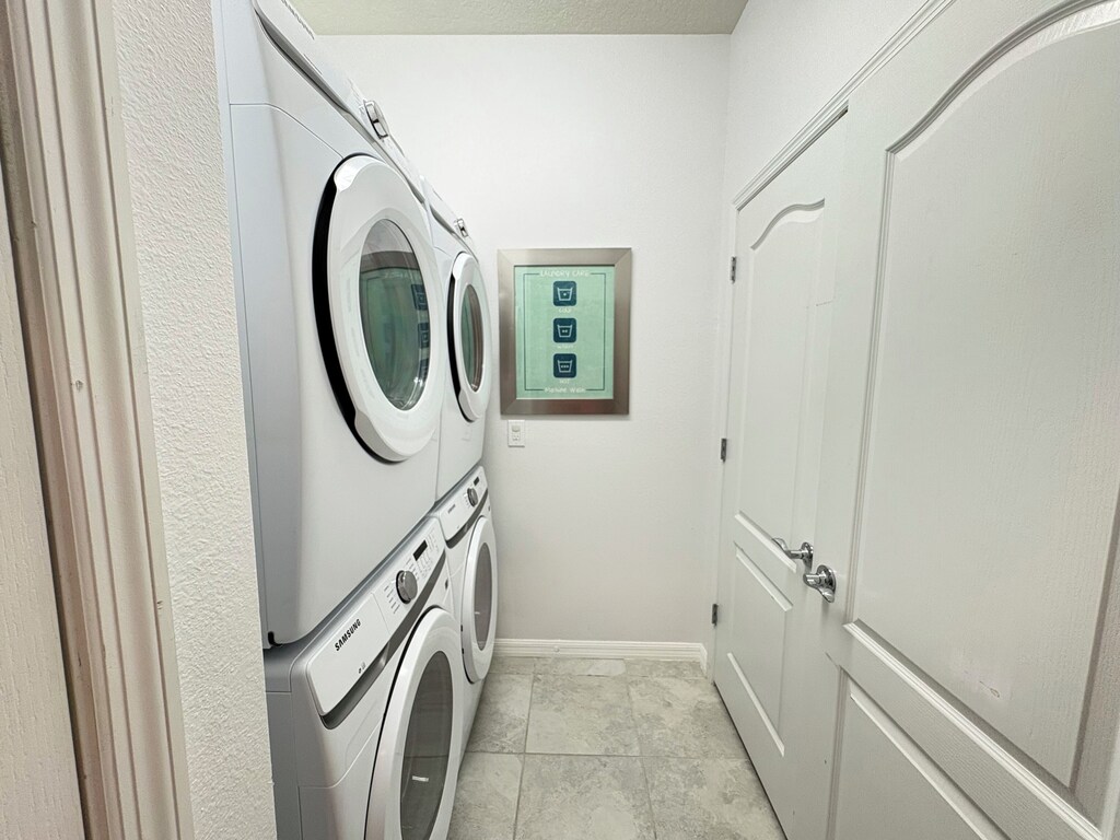 Great laundry room with 2 washers and 2 dryers