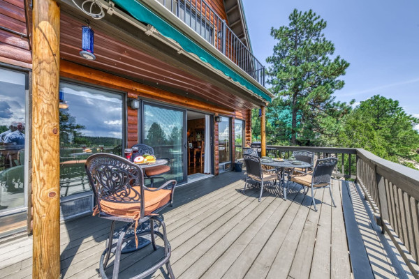 Step outside onto the cabin patio and experience nature at its best, offering a tranquil space to relax, enjoy the views, and cook up a meal on the outside grill.