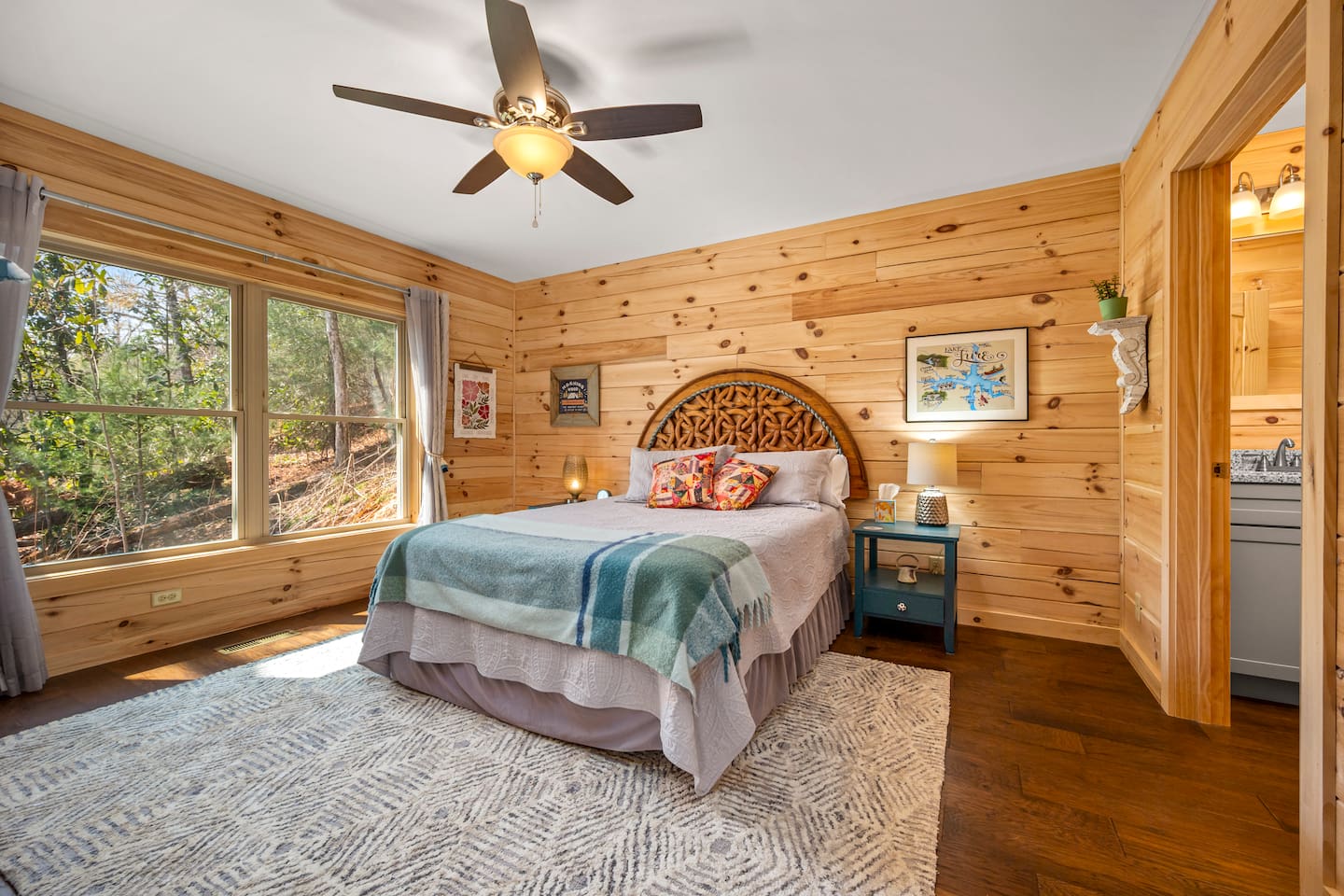Bedroom #1 of the cabin with queen bed and en suite full bathroom