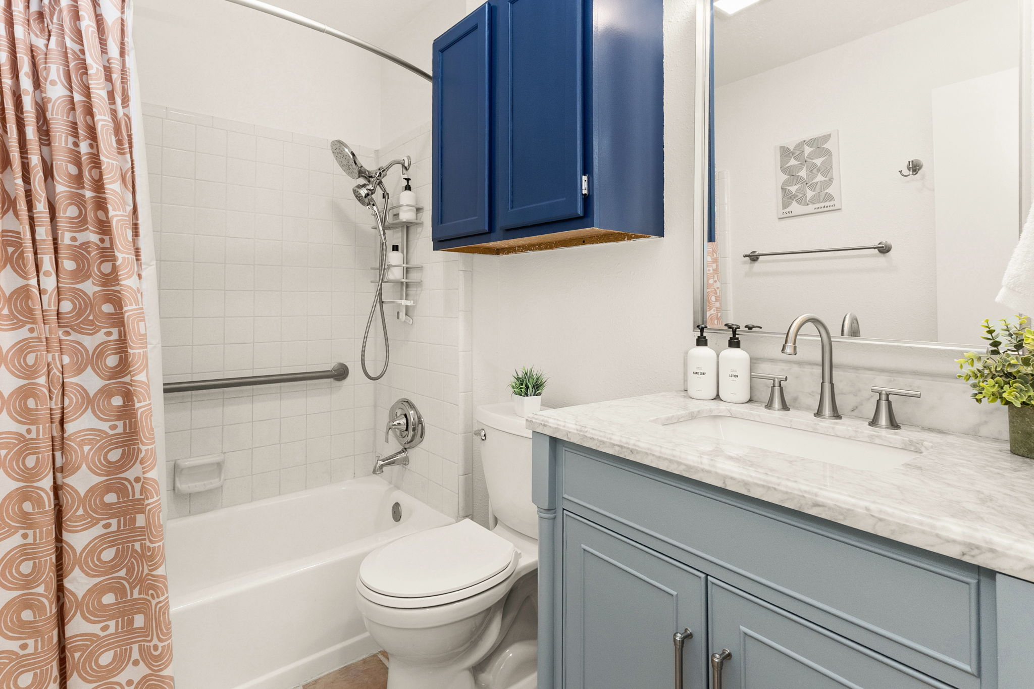 Additional full bathroom with contemporary fixtures