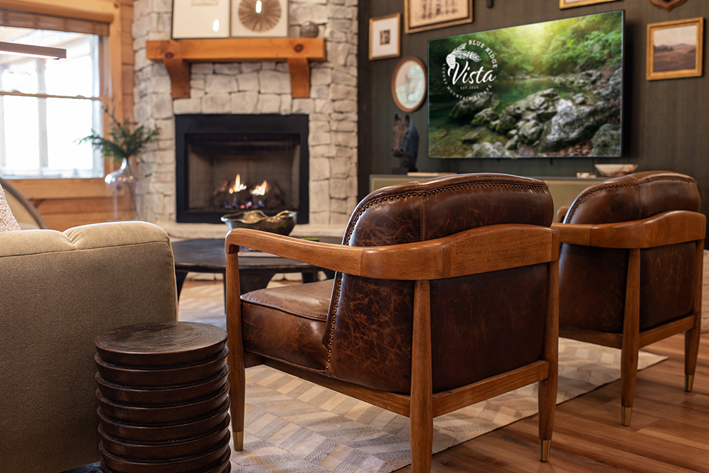 Rich textures and earthy tones make this living room feel grounded and welcoming. A cozy place to unwind or catch a movie.