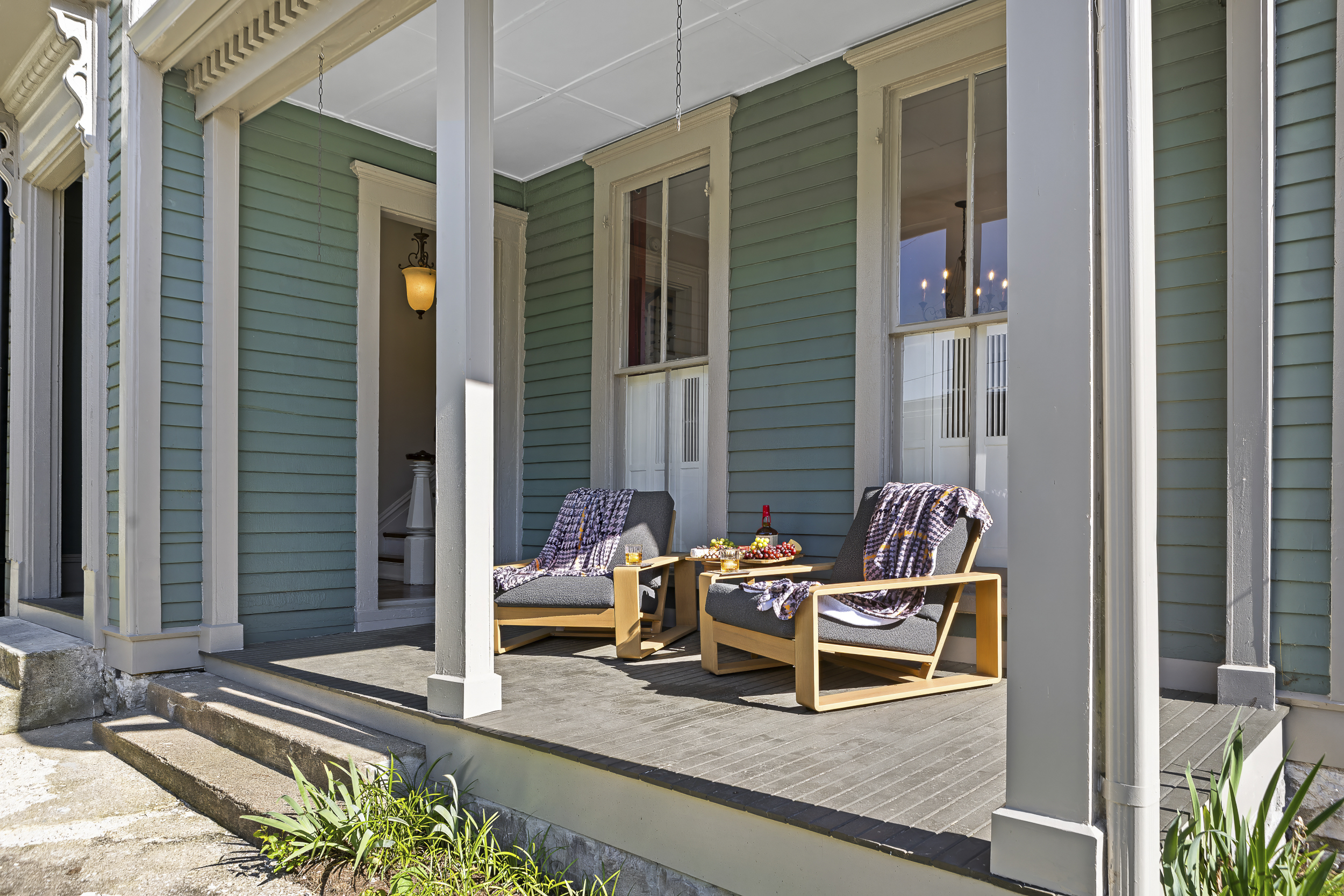 Settle into the covered front porch with a pour and watch Frankfort come alive.