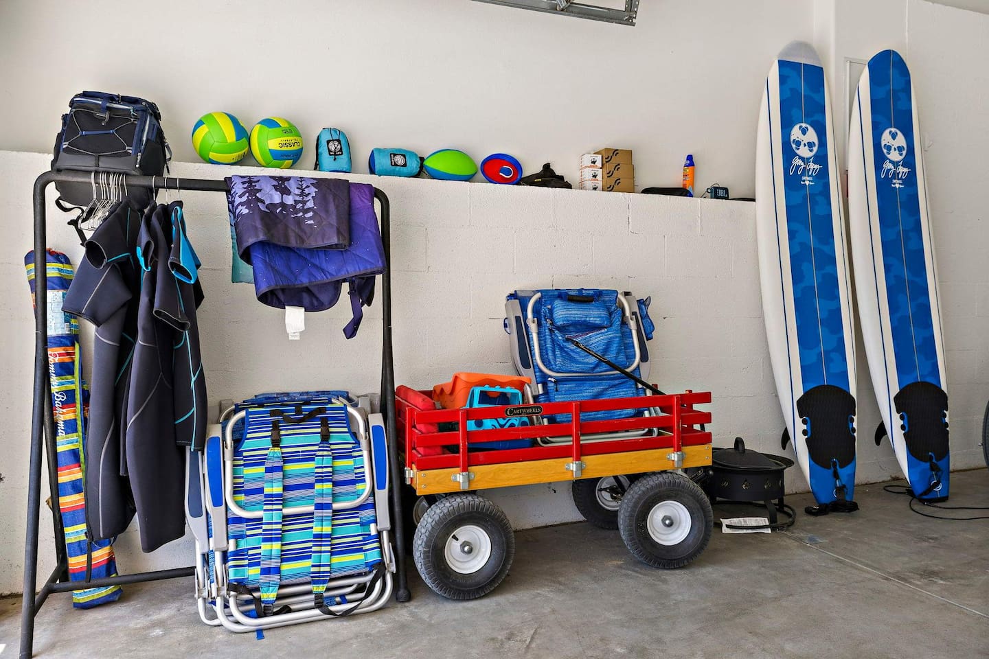 Everything you need to enjoy the best of San Clemente including wetsuits, beach chairs, wagon, umbrella, beach toys, cooler, beach towels, sur boards and boogie boards (see next photo).