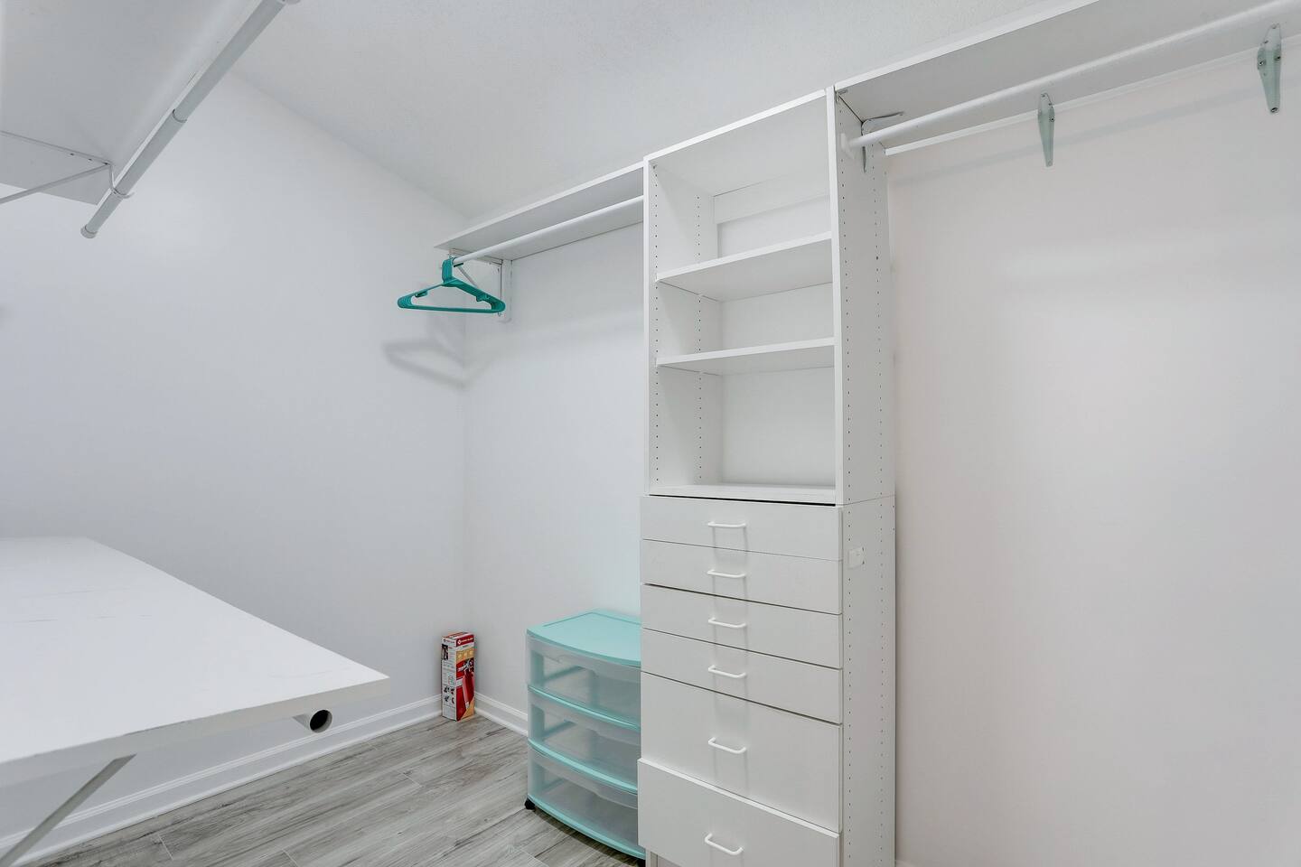 Enjoy ample storage in the spacious primary closet, providing plenty of room for all your belongings.