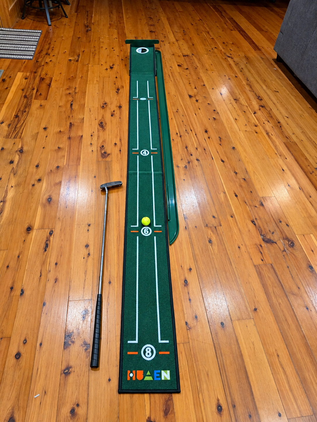 Indoor Putting Green with Neon Golf Ball