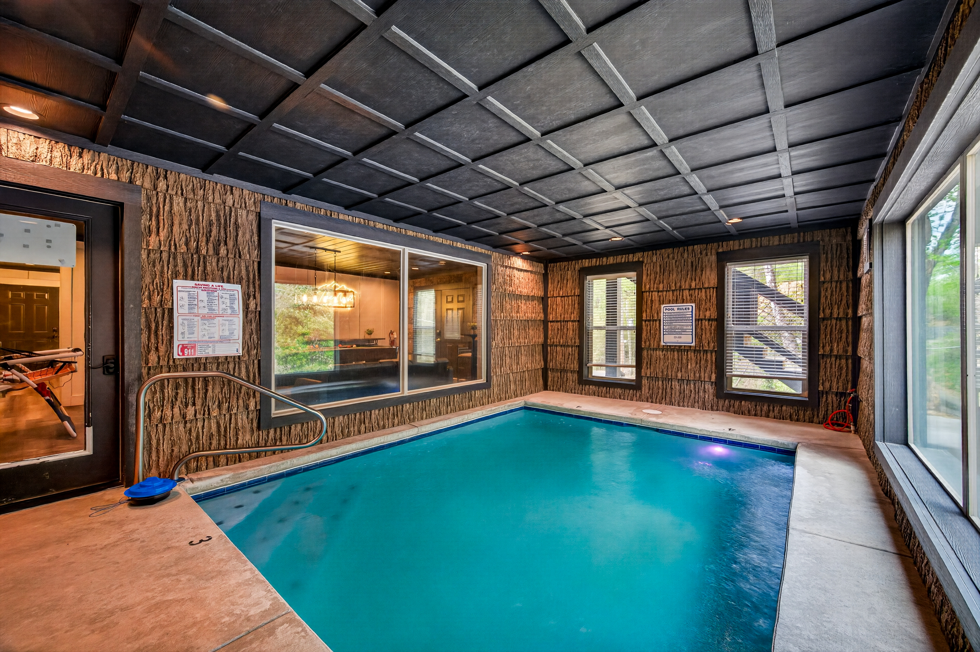Indoor swimming pool. Self-locking safety doors and alarms.