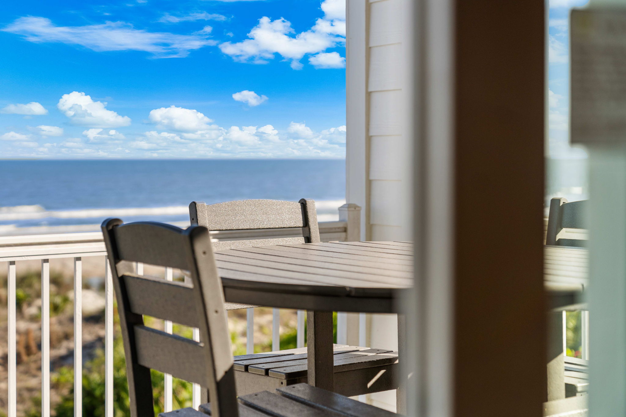 Beachfront porch | Beach Breeze | Oceanview 202 | 1116 Ocean Blvd, Isle of Palms, SC | IOP Escapes