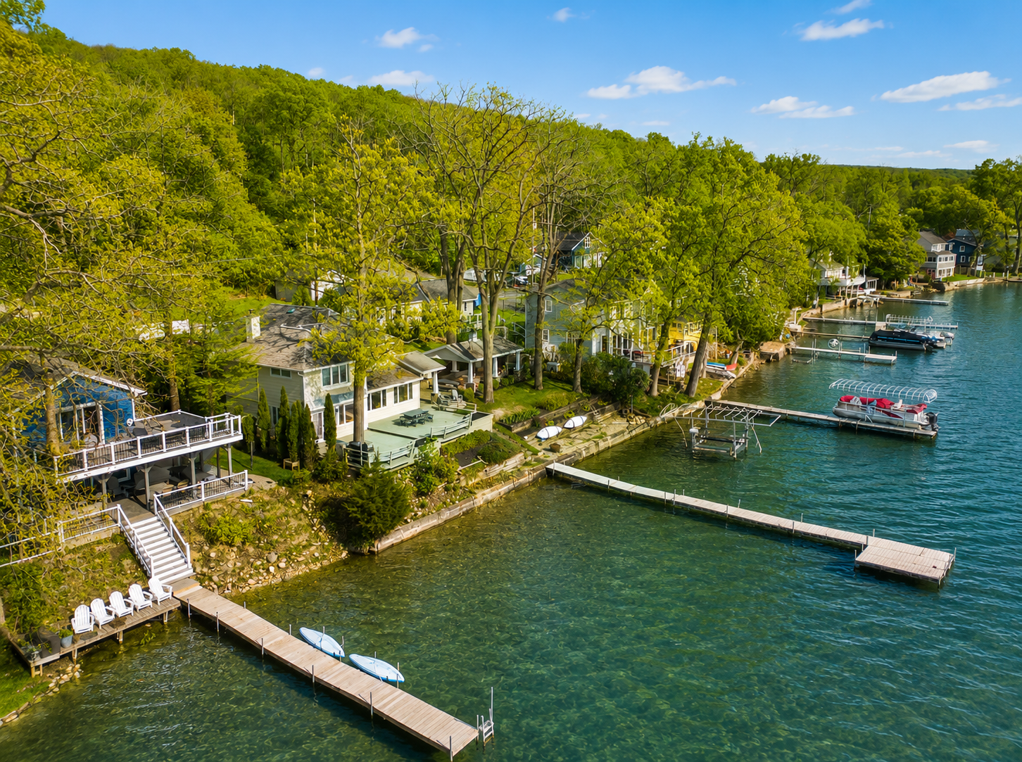 Lakeside homes with private docks, perfect for boating and water activities. Enjoy the serene setting and stunning views, ideal for a peaceful getaway surrounded by nature.