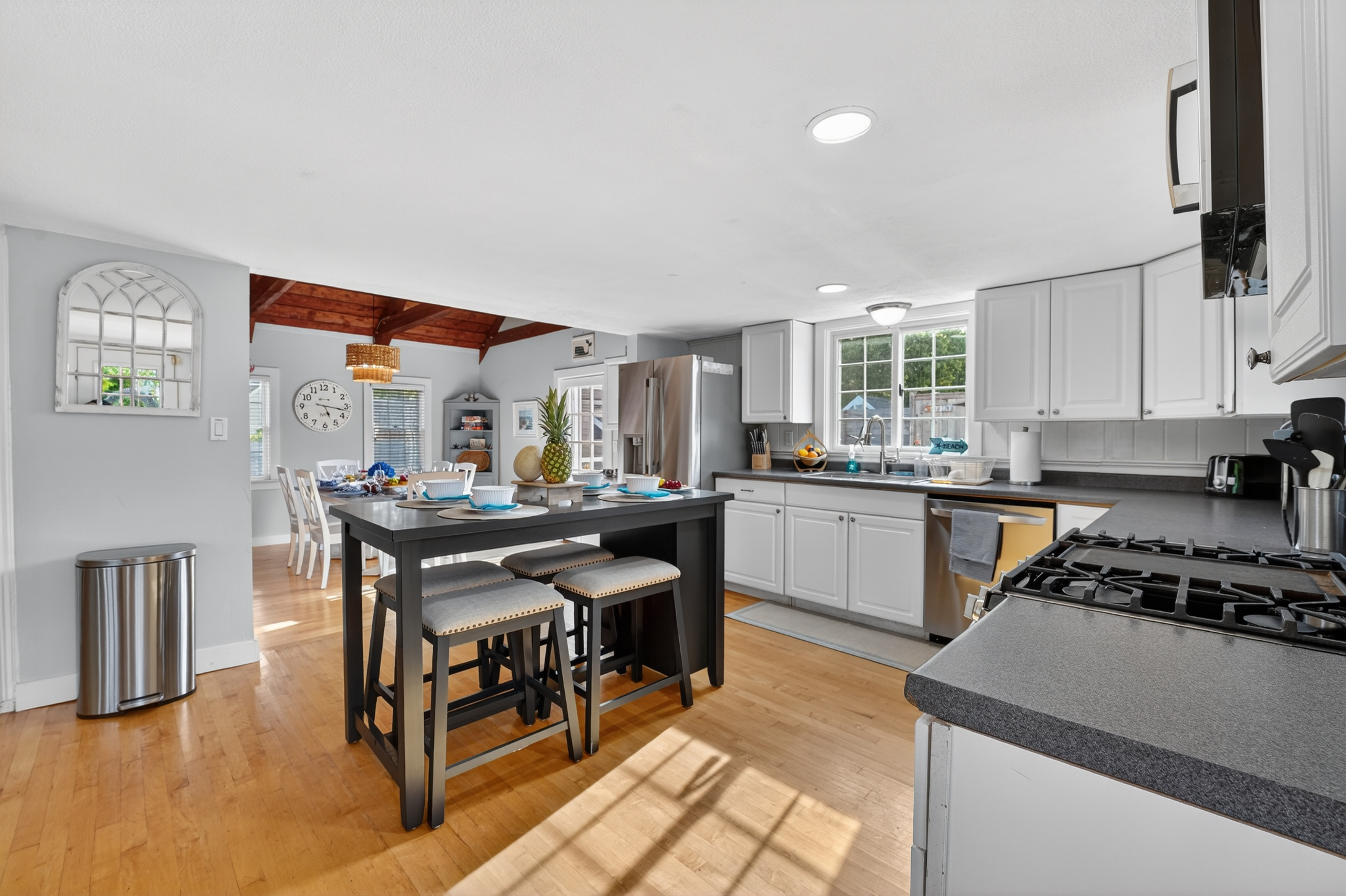 Fully equipped kitchen with modern appliances and a large island for gathering.