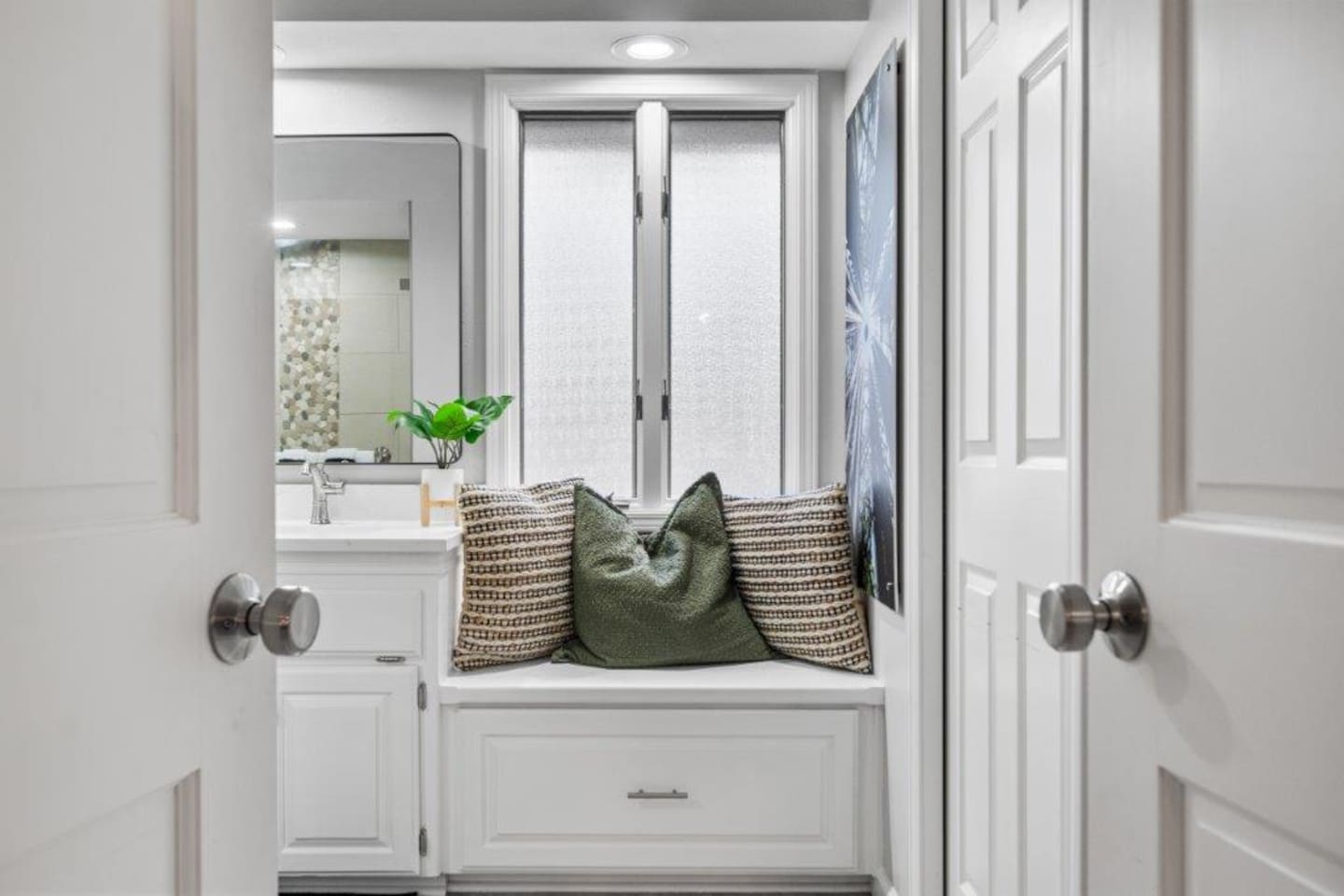 Double Doors open to the Ensuite Bathroom.  The Large Walk-in Closet it to the Right. 